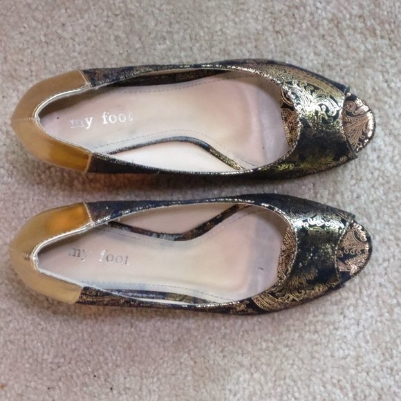 black and gold designer shoes